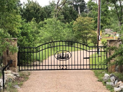 Double arch classic gate from Brenham Iron Works.