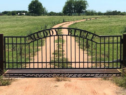 Double arch classic gate from Brenham Iron Works.