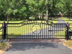 Double arch classic gate from Brenham Iron Works.