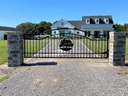 Double arch classic gate from Brenham Iron Works.