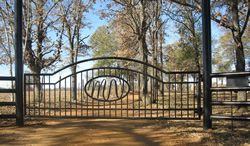 Double arch classic gate from Brenham Iron Works.