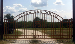 Double arch classic gate from Brenham Iron Works.