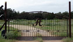 Double arch classic gate from Brenham Iron Works.