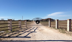 Double arch classic gate from Brenham Iron Works.