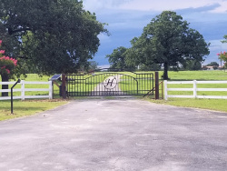 Double arch classic gate from Brenham Iron Works.