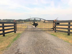 Double arch classic gate from Brenham Iron Works.