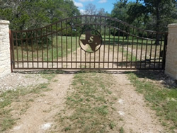 Double arch classic gate from Brenham Iron Works.