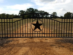 Double arch classic gate from Brenham Iron Works.