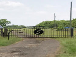 Double arch classic gate from Brenham Iron Works.