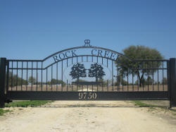 Double arch classic gate from Brenham Iron Works.