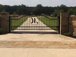 Double arch classic gate from Brenham Iron Works.