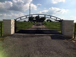 Double arch gate from Brenham Iron Works.