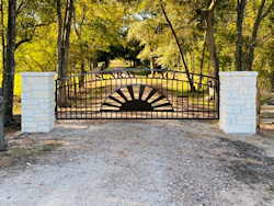 Double arch gate from Brenham Iron Works.