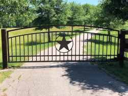 Double arch gate from Brenham Iron Works.