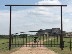 Double arch gate from Brenham Iron Works.