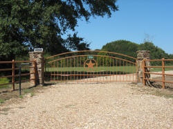 Double arch gate from Brenham Iron Works.