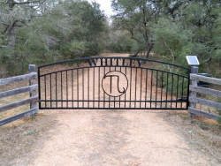 Double arch gate from Brenham Iron Works.