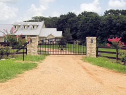 Double arch gate from Brenham Iron Works.