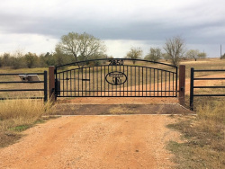 Double arch gate from Brenham Iron Works.