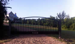 Double arch gate from Brenham Iron Works.