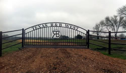 Double arch gate from Brenham Iron Works.