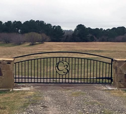 Double arch gate from Brenham Iron Works.