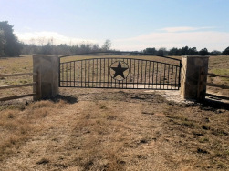 Double arch gate from Brenham Iron Works.