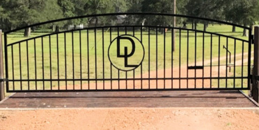 Double arch gate from Brenham Iron Works.