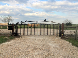 Double arch gate from Brenham Iron Works.