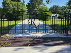 Double arch gate from Brenham Iron Works.