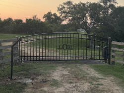 Double arch gate from Brenham Iron Works.